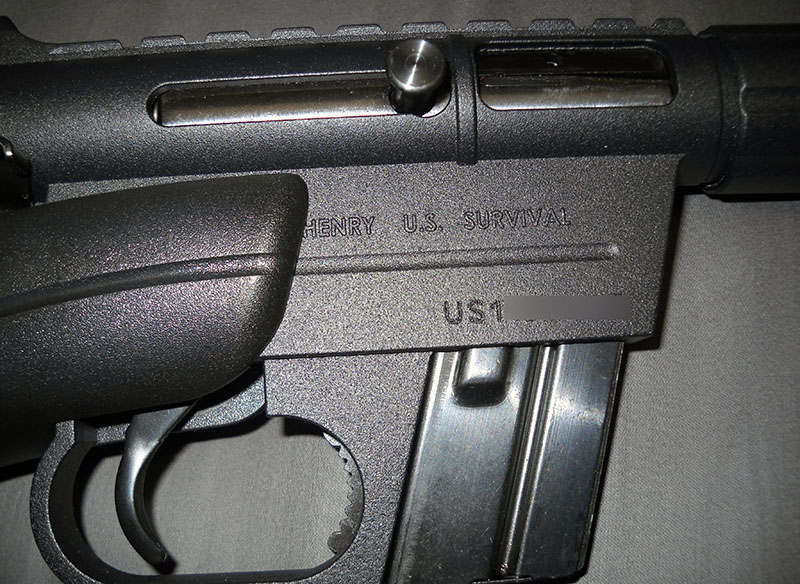 detail, AR-7 receiver, right side with marking: HENRY U.S. SURVIVAL